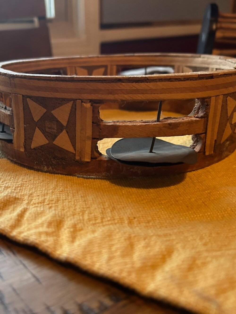Vintage Handmade Tambourine  features a double row of jingles with a unique deco
